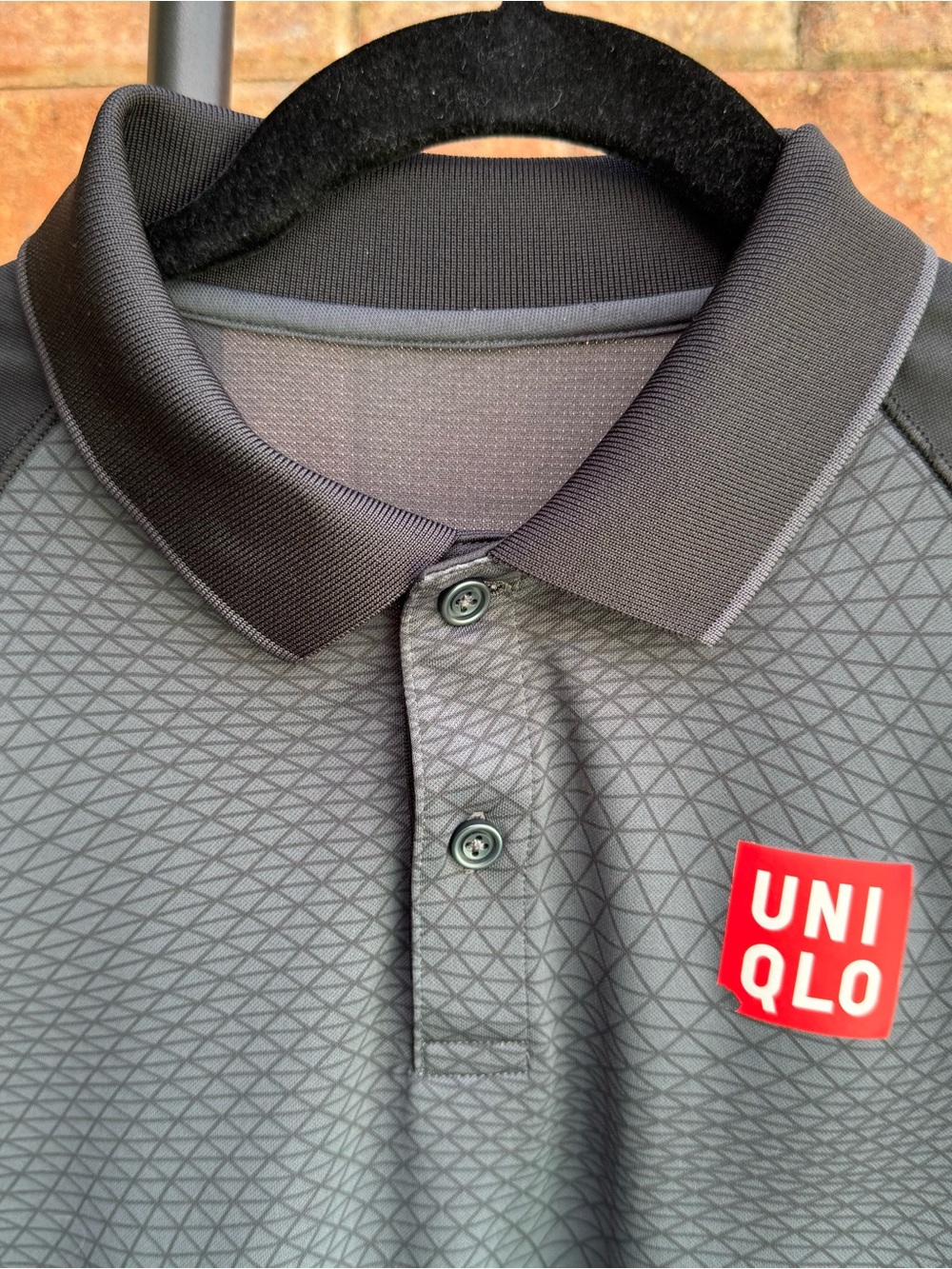 UNIQLO Men’s Dark Gray Geometric Performance Polo with Red Logo